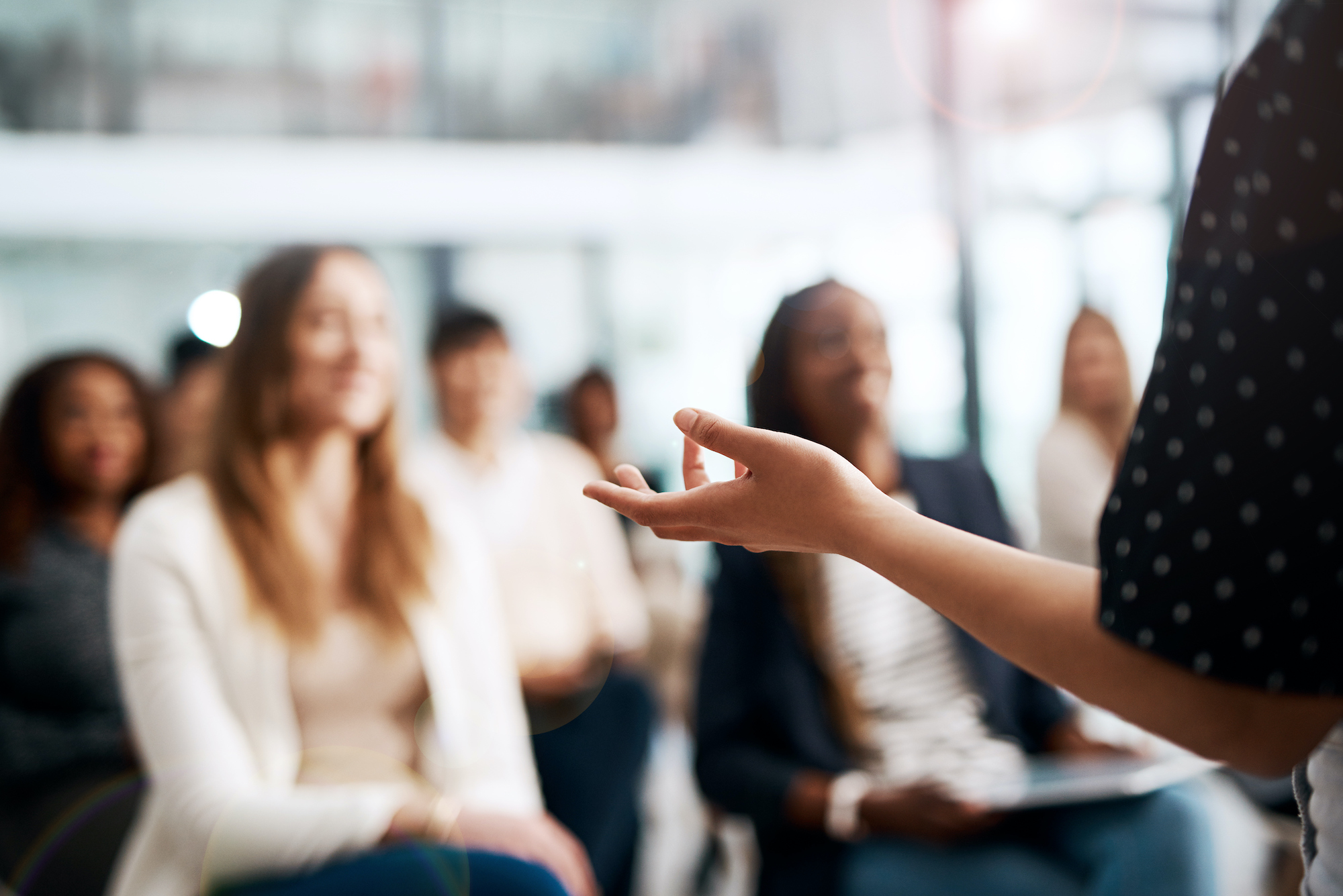 businesswoman delivering a speech during a conference